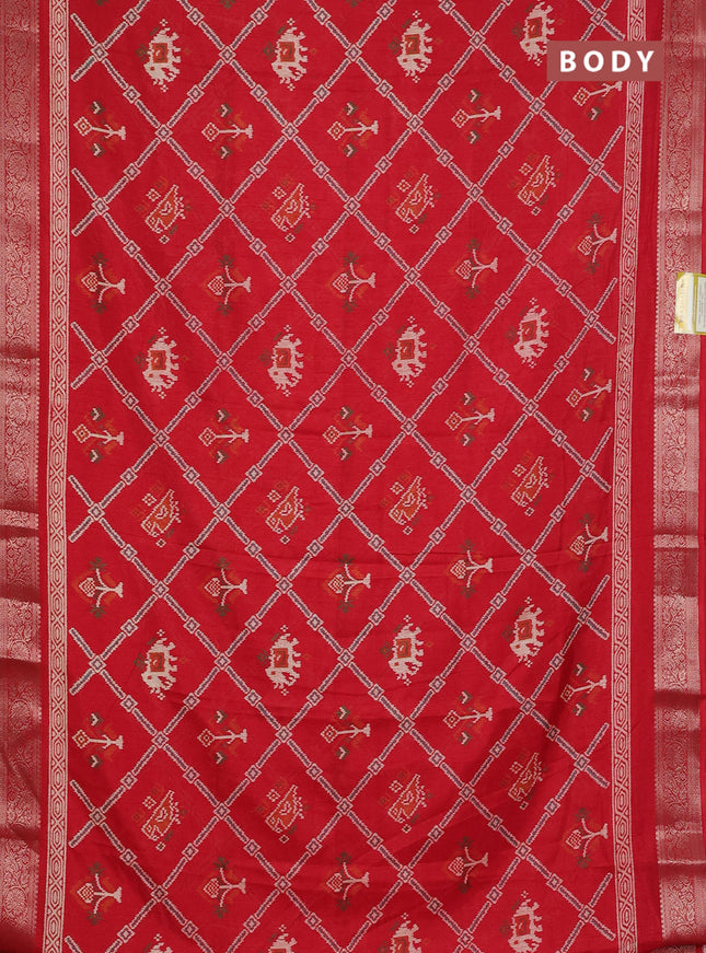 Semi dola saree red with allover patola prints and zari woven border