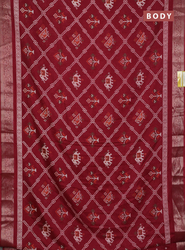 Semi dola saree maroon with allover patola prints and zari woven border