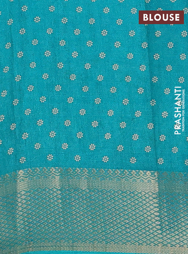 Semi dola saree teal green with allover prints and zari woven border