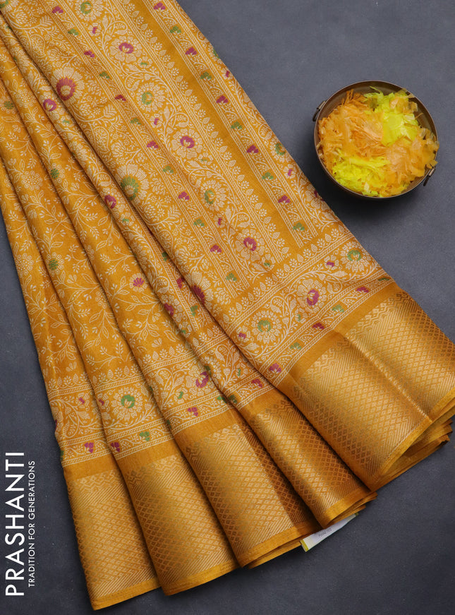 Semi dola saree mustard yellow with allover prints and zari woven border
