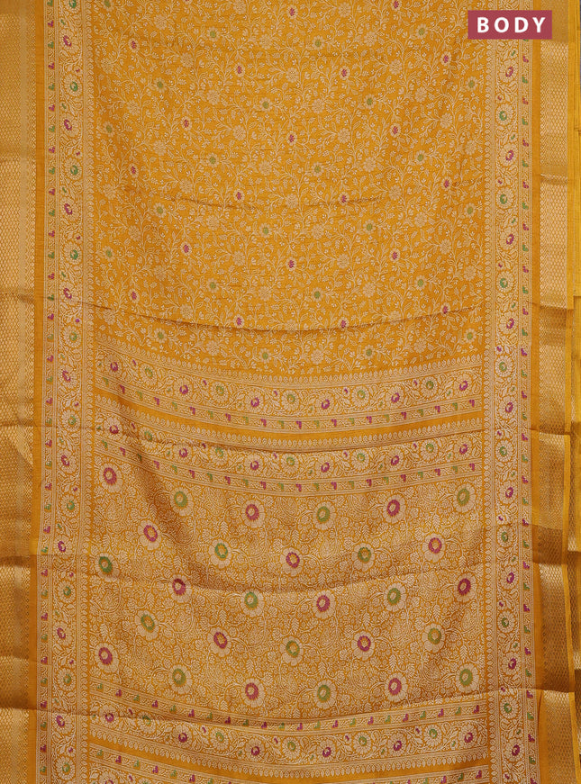 Semi dola saree mustard yellow with allover prints and zari woven border