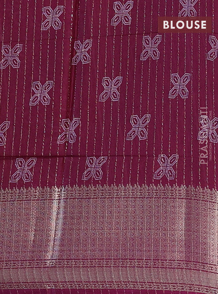 Semi dola saree wine shade with allover prints & zari weaves and zari woven border