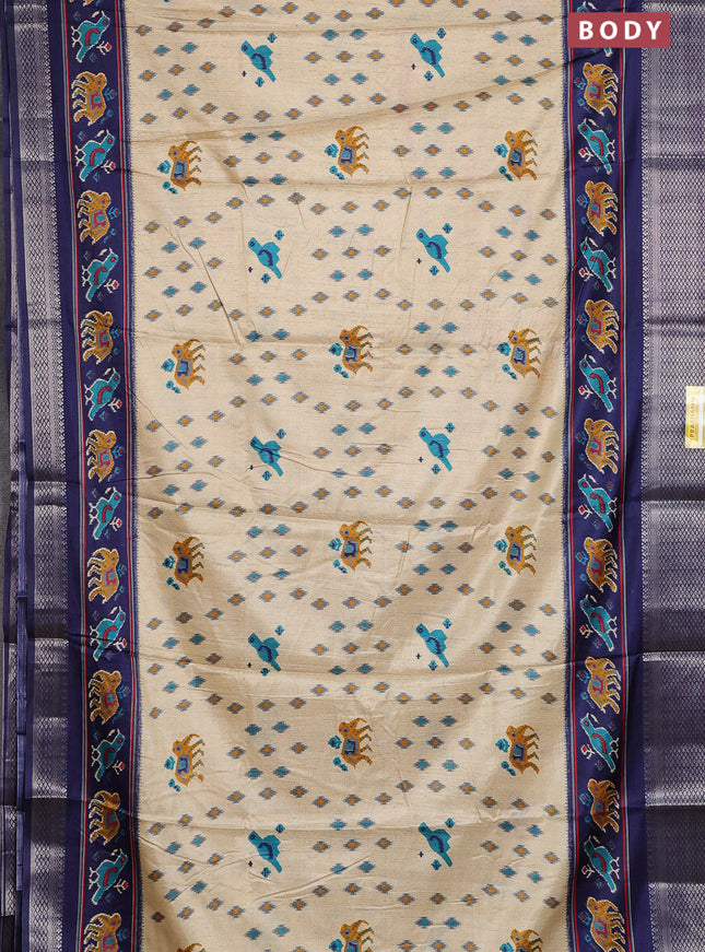 Semi dola saree cream and navy blue with allover patola prints and zari woven border