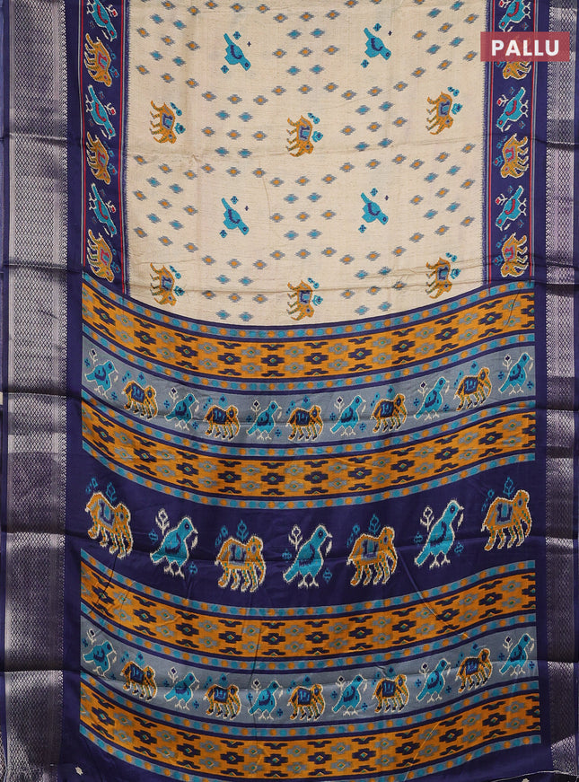 Semi dola saree cream and navy blue with allover patola prints and zari woven border
