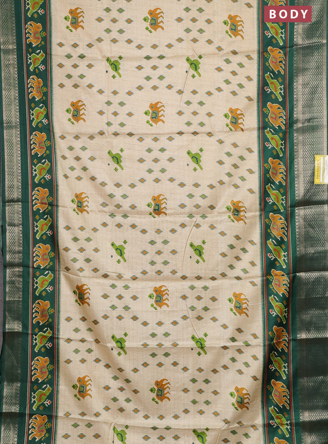 Semi dola saree sandal and green with allover patola prints and zari woven border