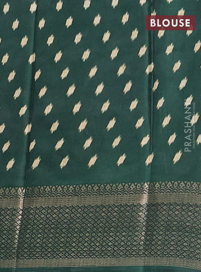 Semi dola saree sandal and green with allover patola prints and zari woven border