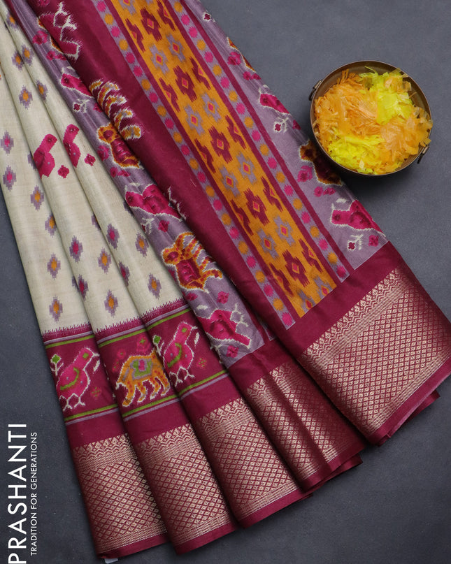 Semi dola saree cream and wine shade with allover patola prints and zari woven border