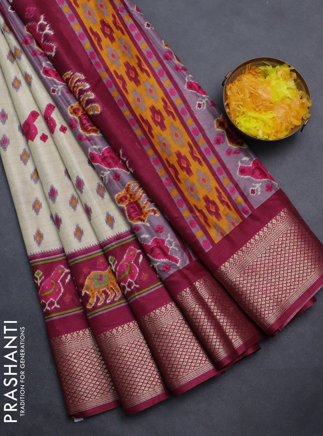 Semi dola saree cream and wine shade with allover patola prints and zari woven border