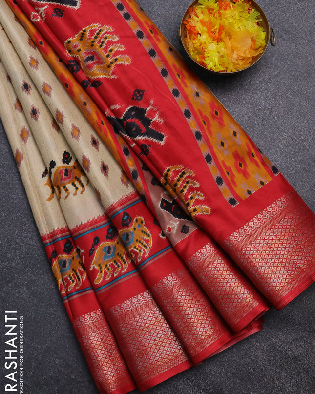 Semi dola saree cream and red with allover patola prints and zari woven border