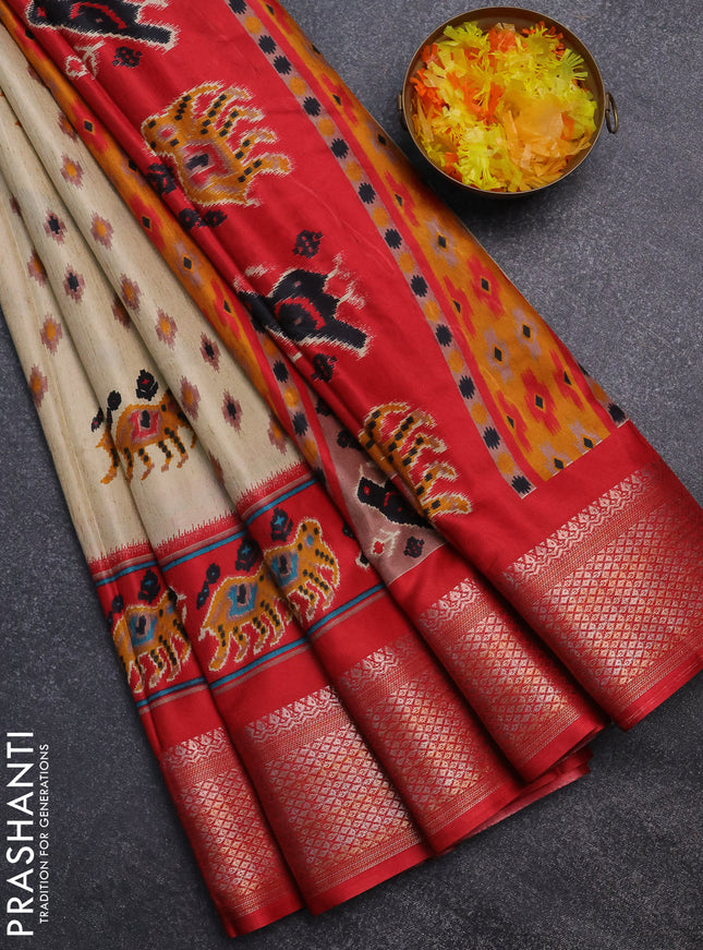 Semi dola saree cream and red with allover patola prints and zari woven border