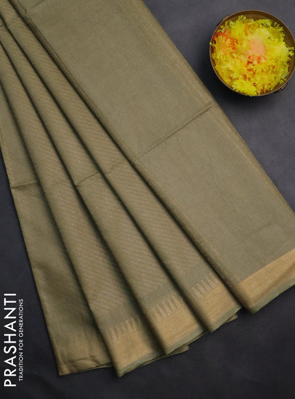 Semi munga jacquard saree pastel green with allover zari weaves and zari woven border