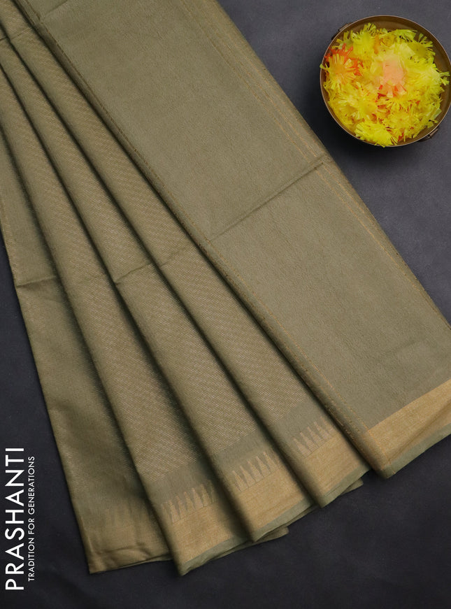 Semi munga jacquard saree pastel green with allover zari weaves and zari woven border