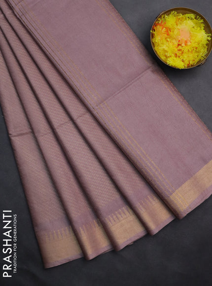 Semi munga jacquard saree pastel pink with allover zari weaves and zari woven border