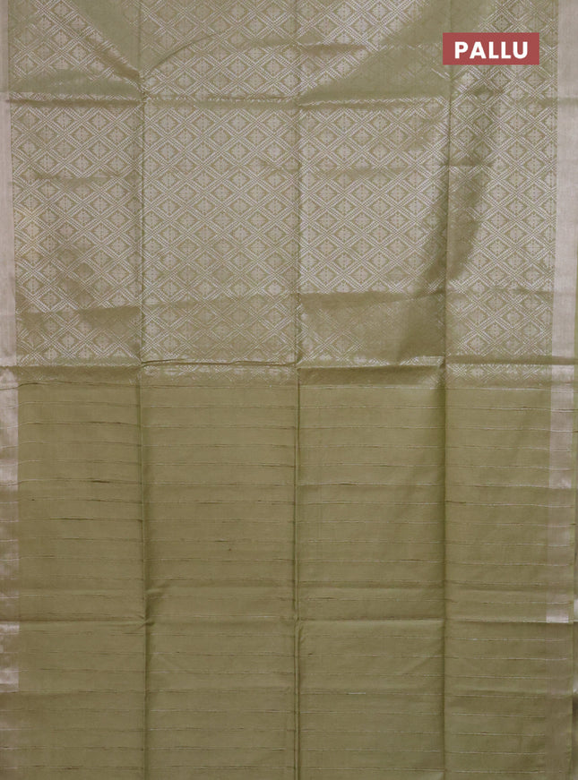 Semi munga jacquard saree pastel green with allover silver zari weaves and zari woven border