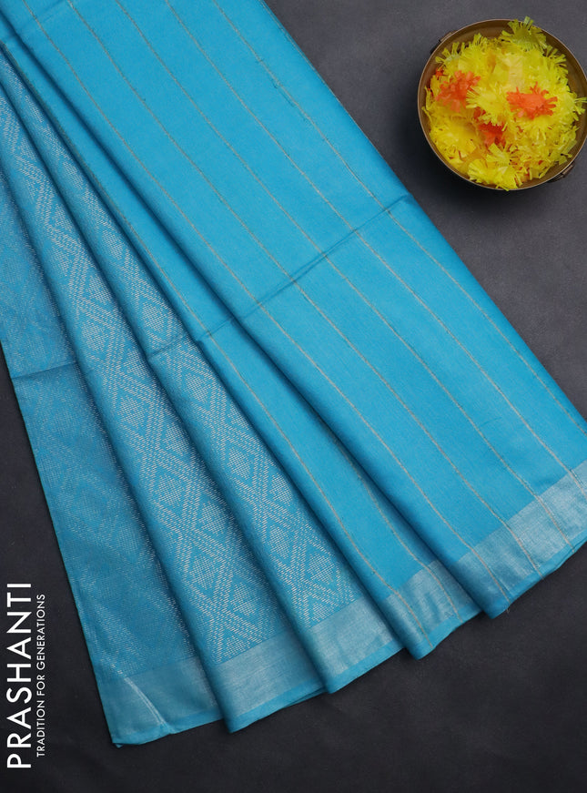 Semi munga jacquard saree light blue with allover silver zari weaves and zari woven border