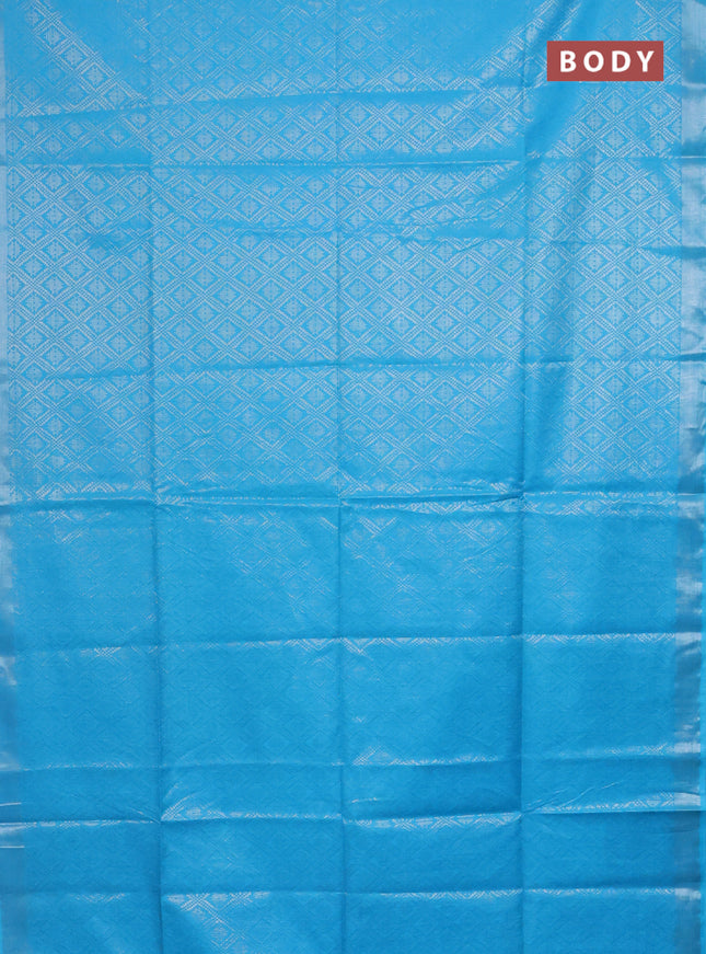 Semi munga jacquard saree light blue with allover silver zari weaves and zari woven border