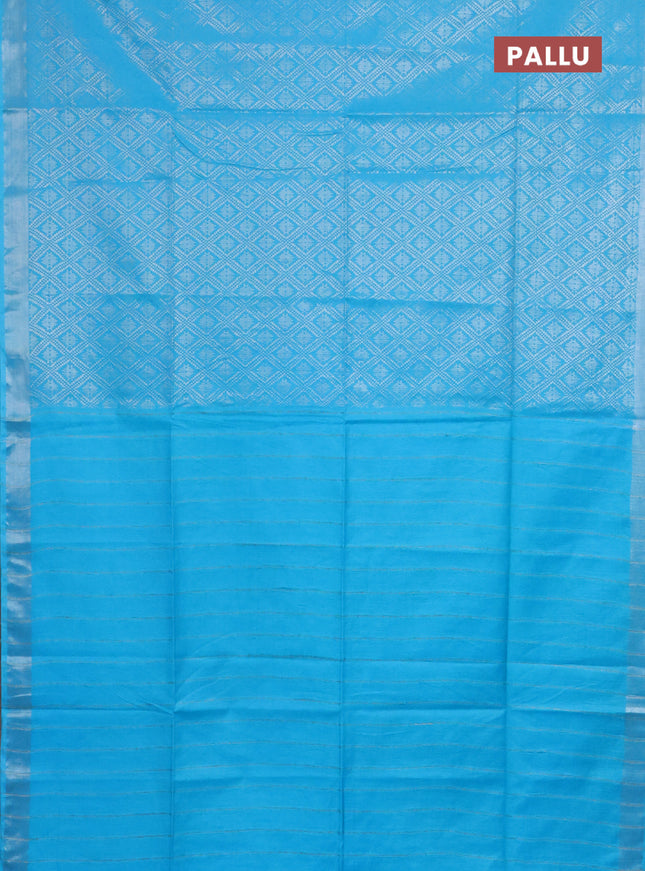 Semi munga jacquard saree light blue with allover silver zari weaves and zari woven border