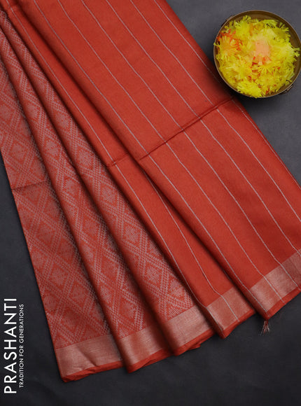 Semi munga jacquard saree orange with allover silver zari weaves and zari woven border