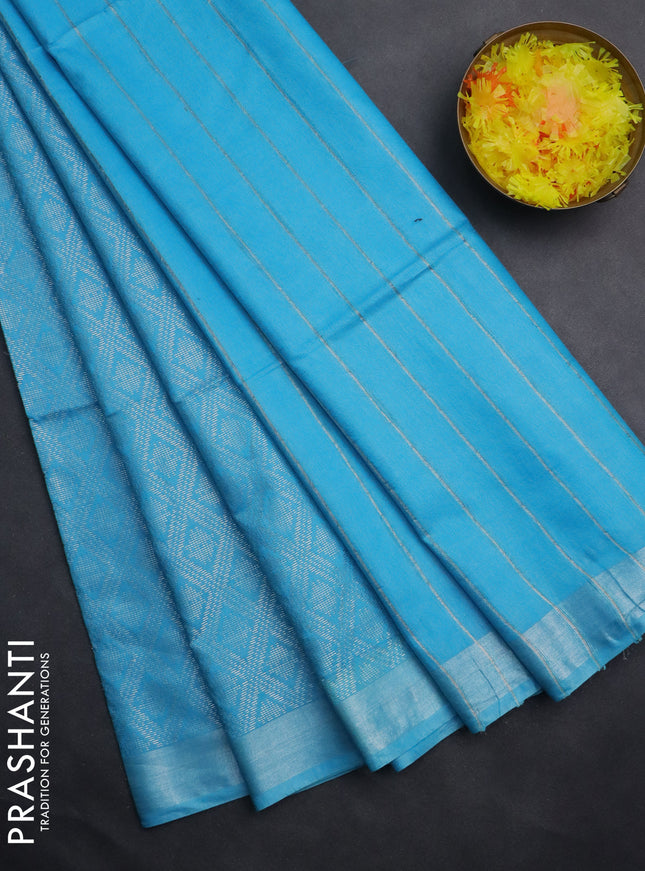 Semi munga jacquard saree light blue with allover silver zari weaves and zari woven border