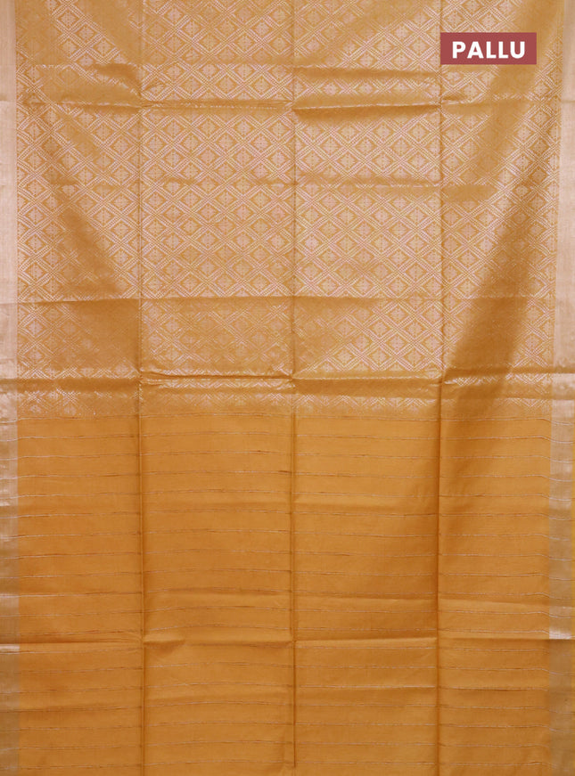 Semi munga jacquard saree mustard yellow with allover silver zari weaves and zari woven border