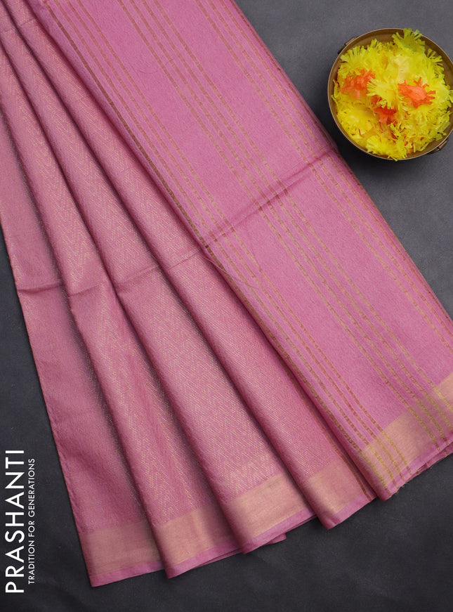 Semi munga jacquard saree pastel pink with allover zari weaves and zari woven border