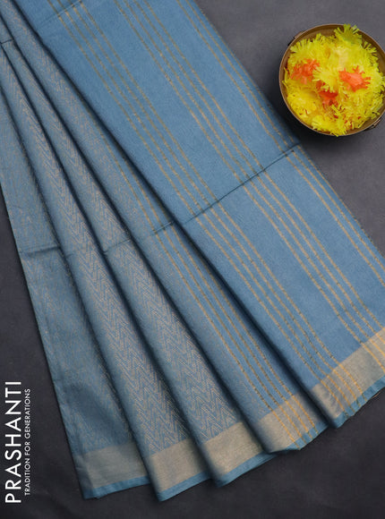 Semi munga jacquard saree pastel blue with allover zari weaves and zari woven border
