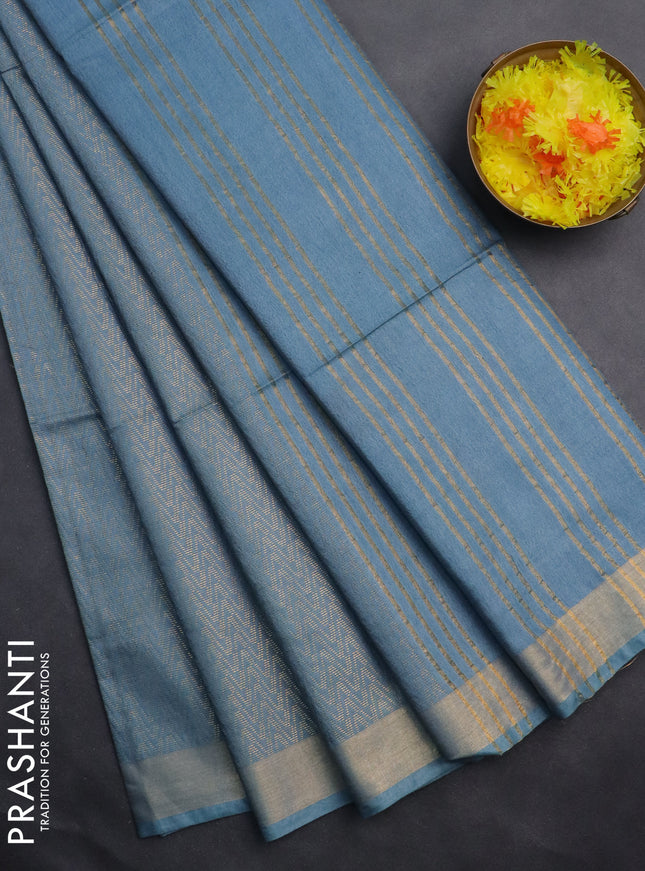 Semi munga jacquard saree pastel blue with allover zari weaves and zari woven border