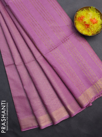 Semi munga jacquard saree mauve pink with allover zari weaves and zari woven border