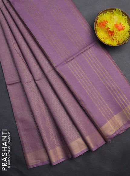 Semi munga jacquard saree pastel lavender with allover zari weaves and zari woven border