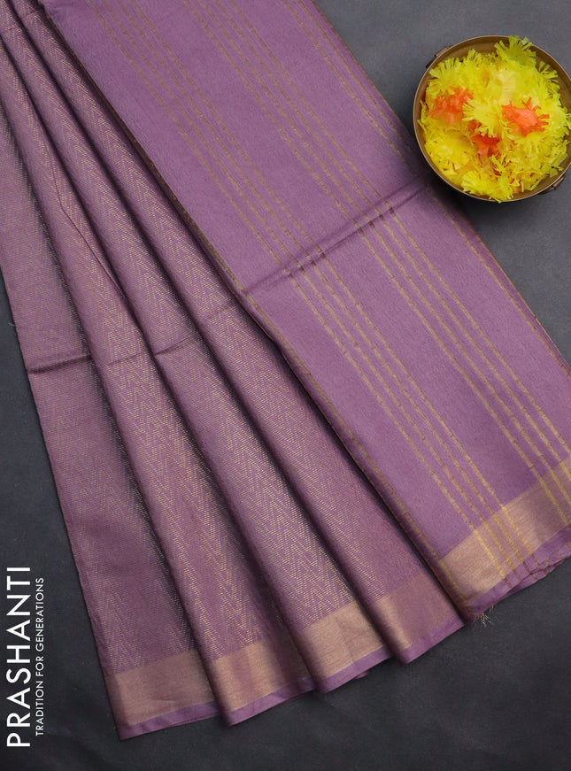 Semi munga jacquard saree pastel lavender with allover zari weaves and zari woven border