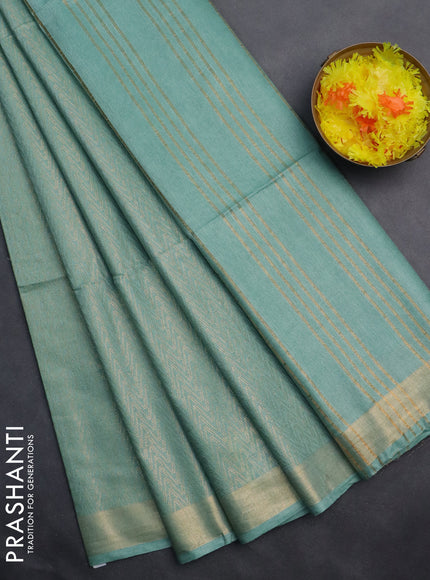 Semi munga jacquard saree pastel green with allover zari weaves and zari woven border