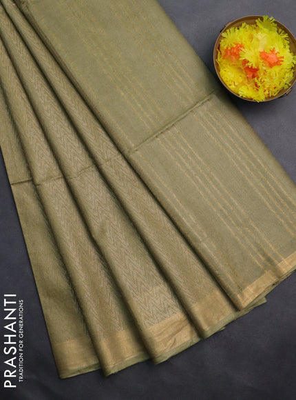 Semi munga jacquard saree pastel green with allover zari weaves and zari woven border