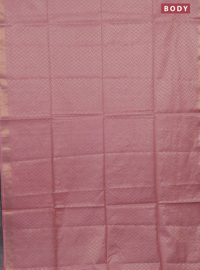 Semi munga jacquard saree peach shade with allover zari weaves and zari woven border