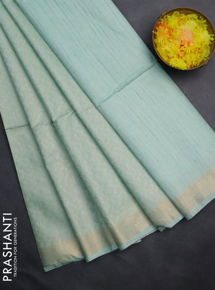 Semi munga jacquard saree pastel green with allover zari weaves and zari woven border