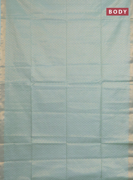 Semi munga jacquard saree pastel green with allover zari weaves and zari woven border