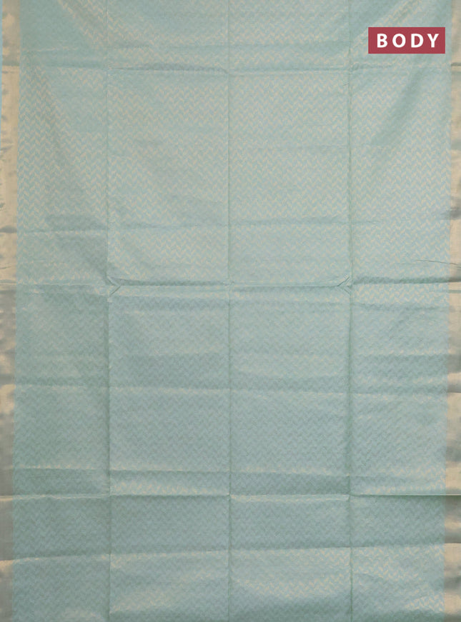 Semi munga jacquard saree pastel green with allover zari weaves and zari woven border