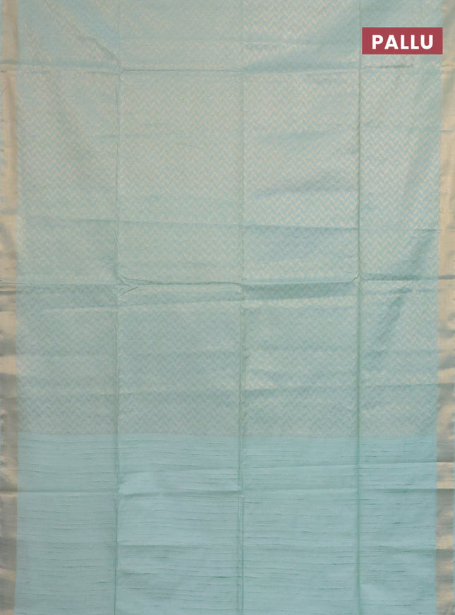 Semi munga jacquard saree pastel green with allover zari weaves and zari woven border