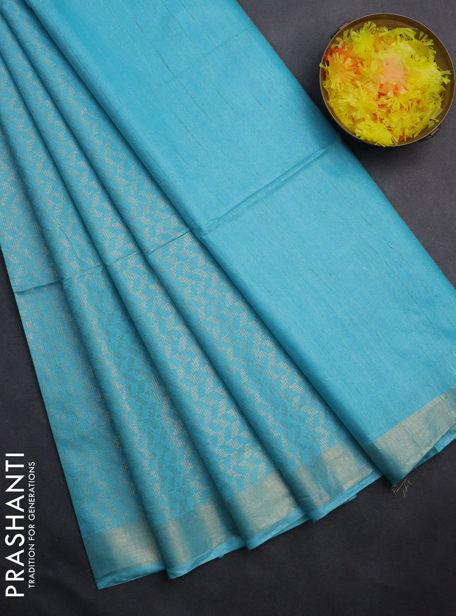 Semi munga jacquard saree light blue with allover zari weaves and zari woven border