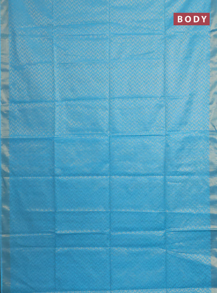 Semi munga jacquard saree light blue with allover zari weaves and zari woven border