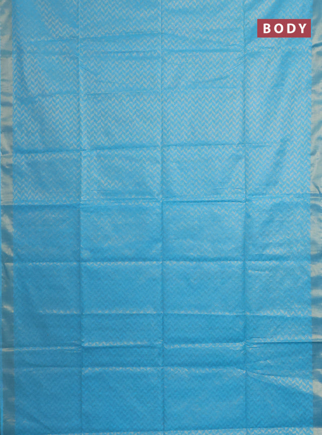 Semi munga jacquard saree light blue with allover zari weaves and zari woven border