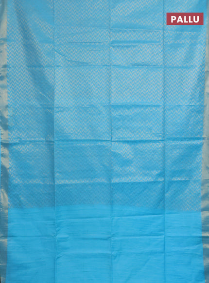 Semi munga jacquard saree light blue with allover zari weaves and zari woven border