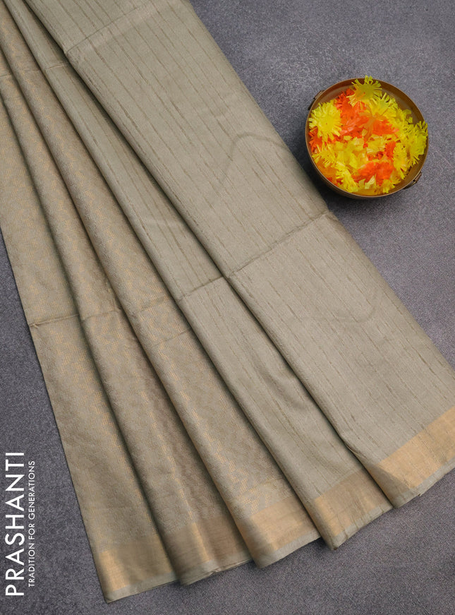 Semi munga jacquard saree pastel green with allover zari weaves and zari woven border