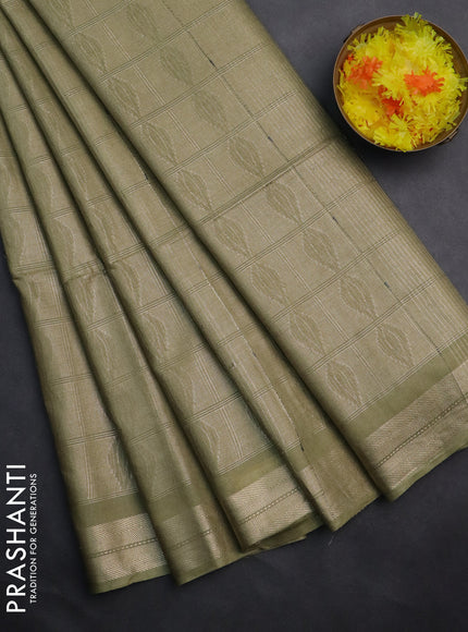 Semi munga jacquard saree green shade with allover zari weaves and zari woven border