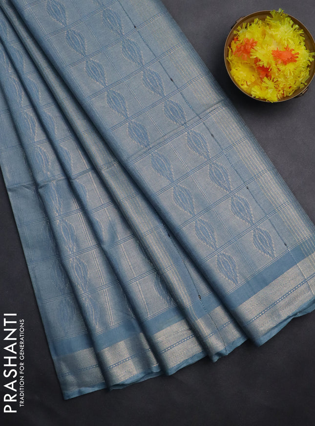 Semi munga jacquard saree pastel blue with allover zari weaves and zari woven border