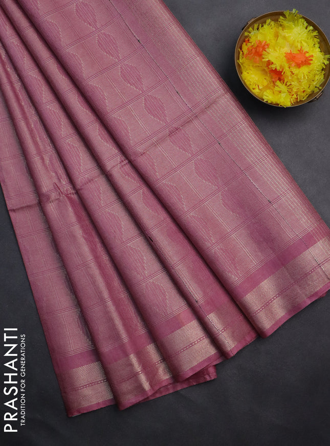 Semi munga jacquard saree mauve pink with allover zari weaves and zari woven border