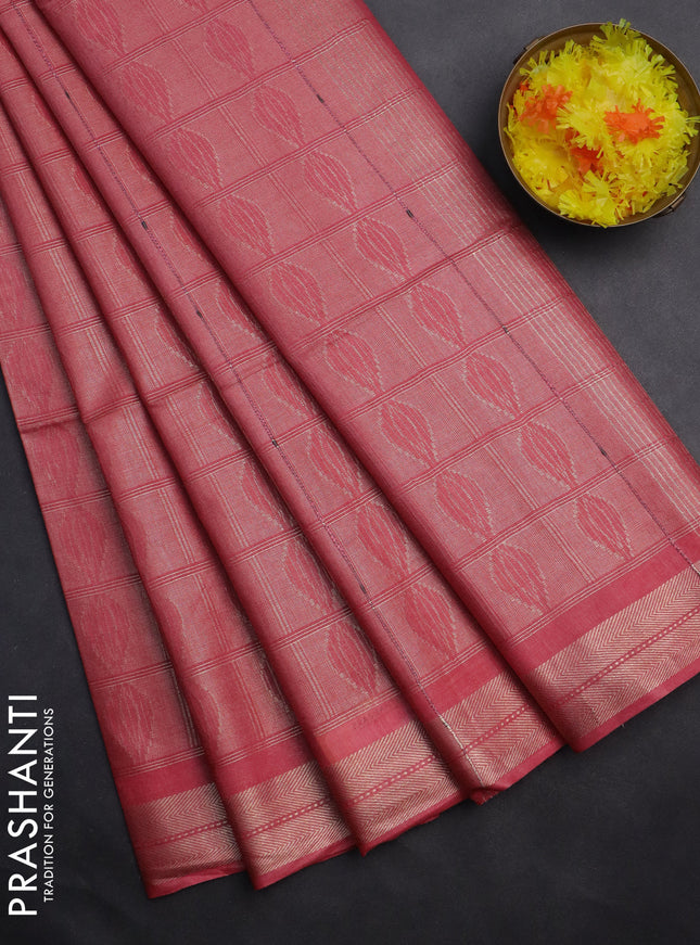 Semi munga jacquard saree peach pink with allover zari weaves and zari woven border