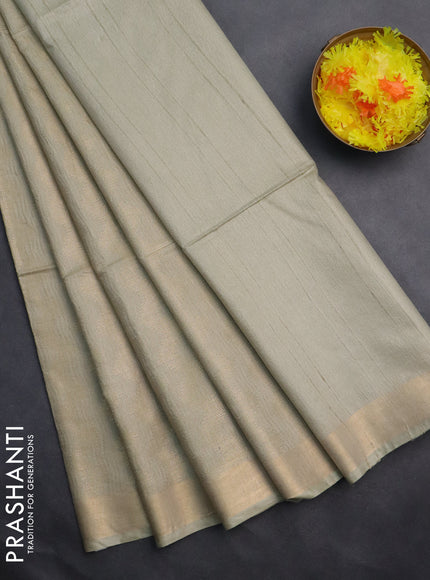 Semi munga jacquard saree mild pista green with allover zari weaves and zari woven border