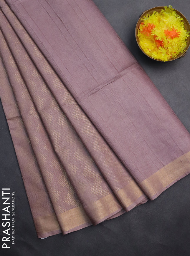 Semi munga jacquard saree pastel brown with allover zari weaves and zari woven border