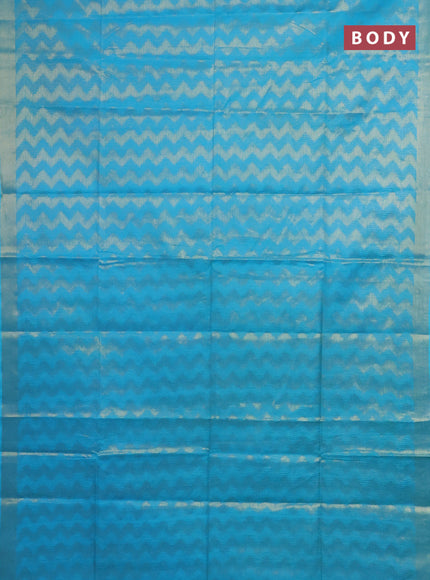 Semi munga jacquard saree teal blue with allover zari weaves and zari woven border