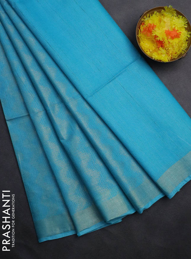 Semi munga jacquard saree light blue with allover zari weaves and zari woven border